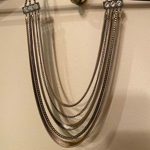 Multi chain necklace with diamond like studs